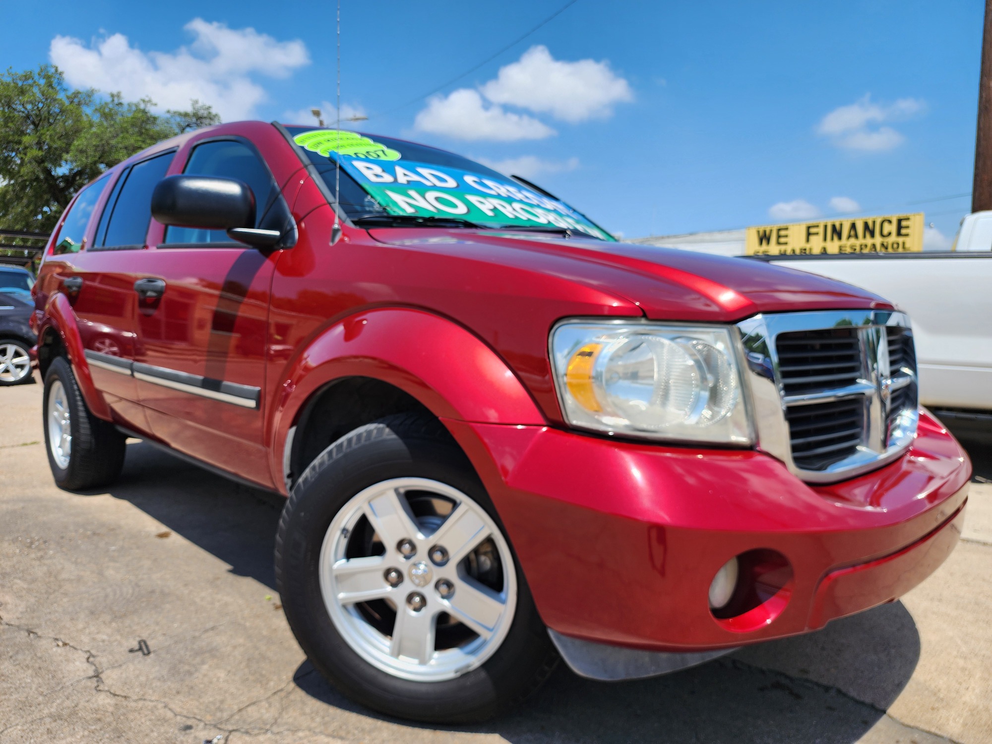 2007 RED /GRAY Dodge Durango SLT (1D8HD48P47F) with an 4.7L V8 SOHC 16V FFV engine, AUTO transmission, located at 2660 S.Garland Avenue, Garland, TX, 75041, (469) 298-3118, 32.885387, -96.656776 - Welcome to DallasAutos4Less, one of the Premier BUY HERE PAY HERE Dealers in the North Dallas Area. We specialize in financing to people with NO CREDIT or BAD CREDIT. We need proof of income, proof of residence, and a ID. Come buy your new car from us today!! This is a 2007 Dodge Durango SLT SUV! - Photo #0